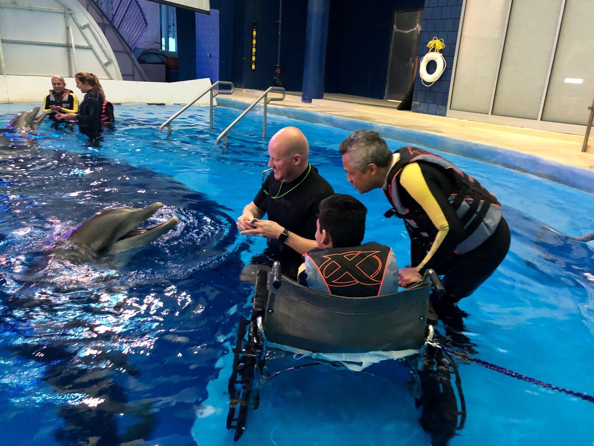 Hoops and his son Cannon at the Indy Zoo Dolphin Experience