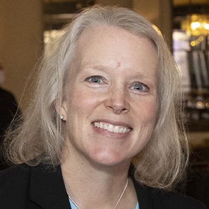 woman smiling, wearing black shirt