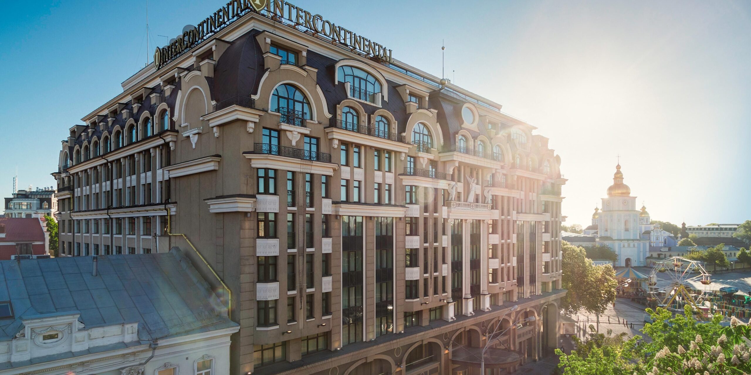 aerial shot of hotel flanked by sun