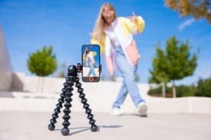 girl dancing in front of phone