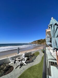 outdoor hotel space next to ocean shore