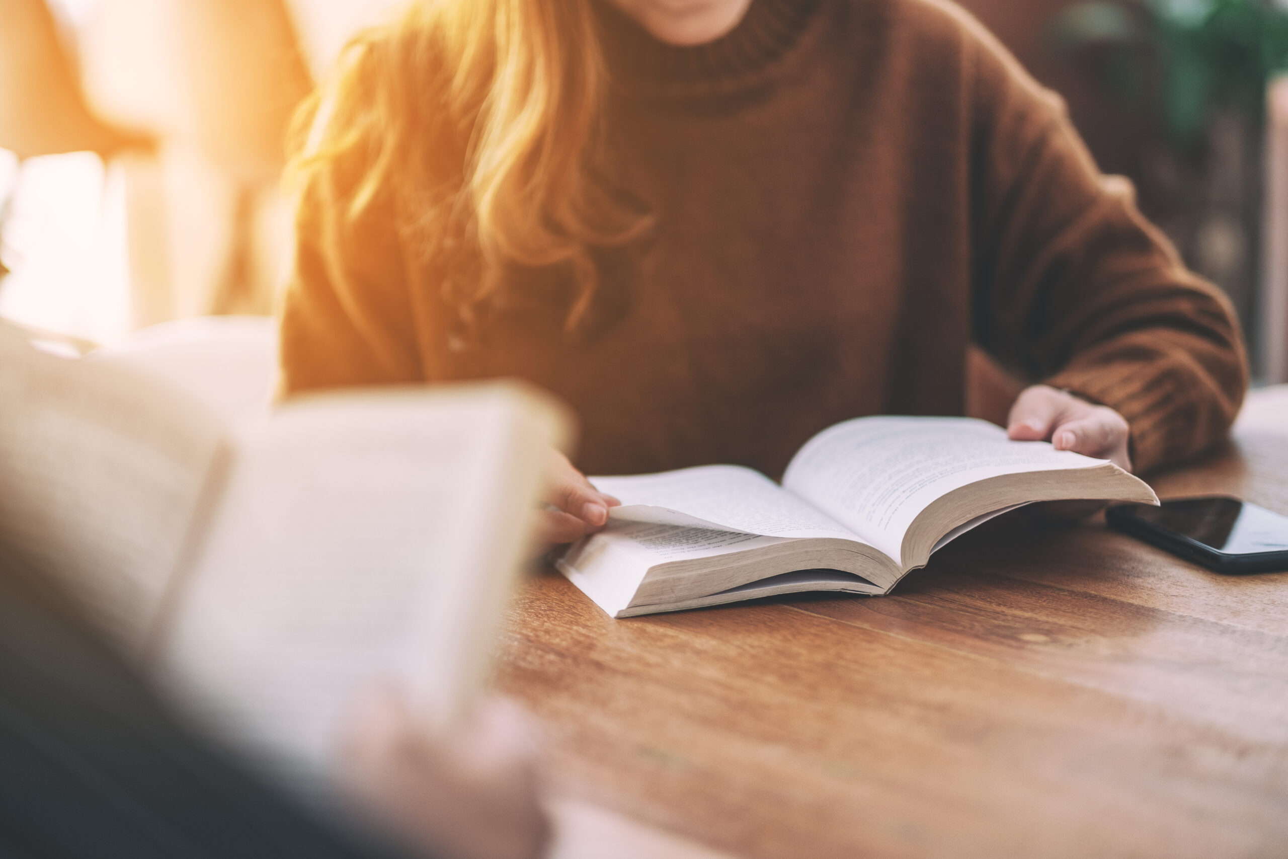 woman reading book