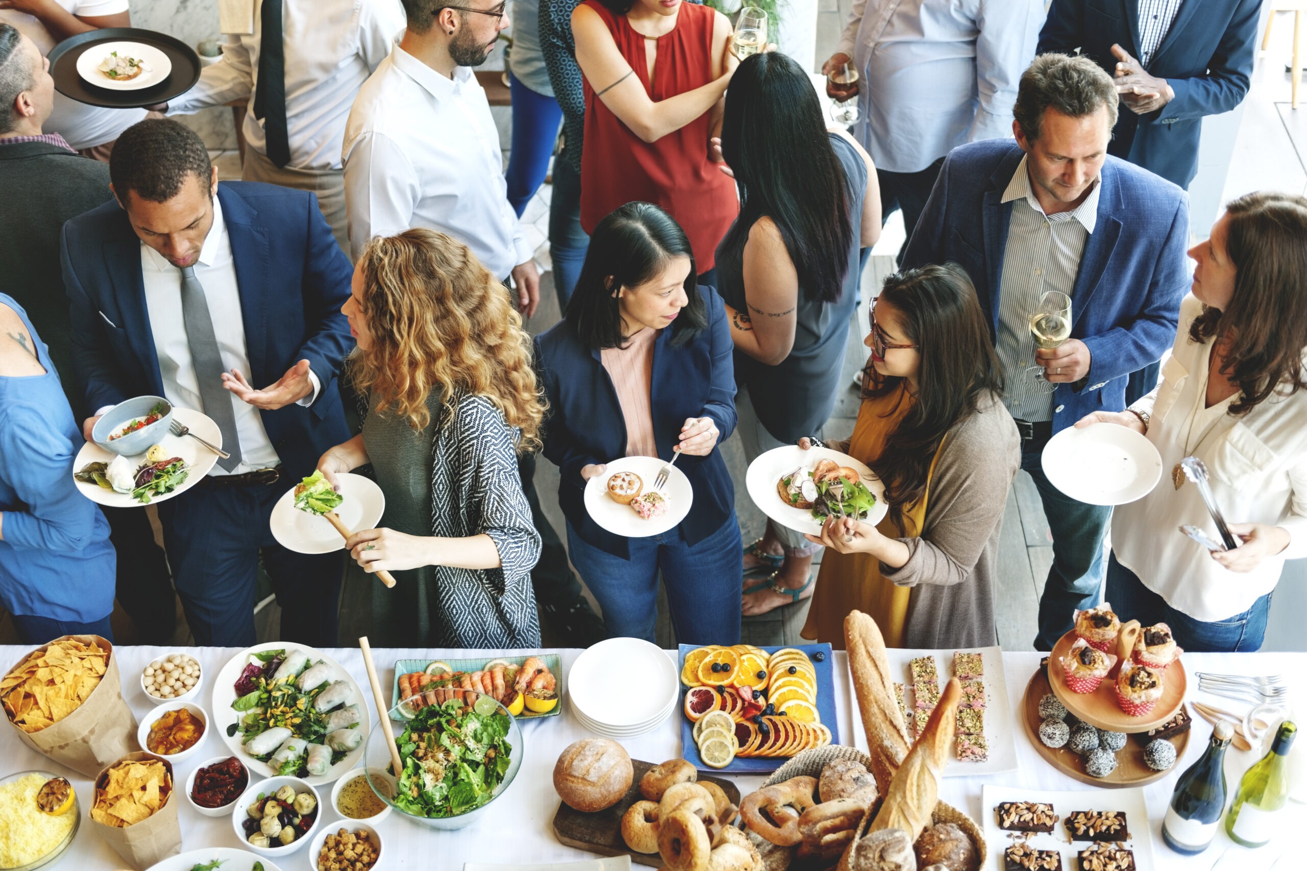 people eating at large event