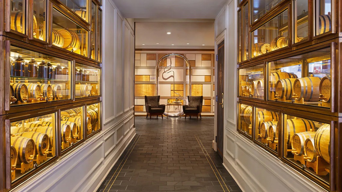 private room lined with barrels encased in glass