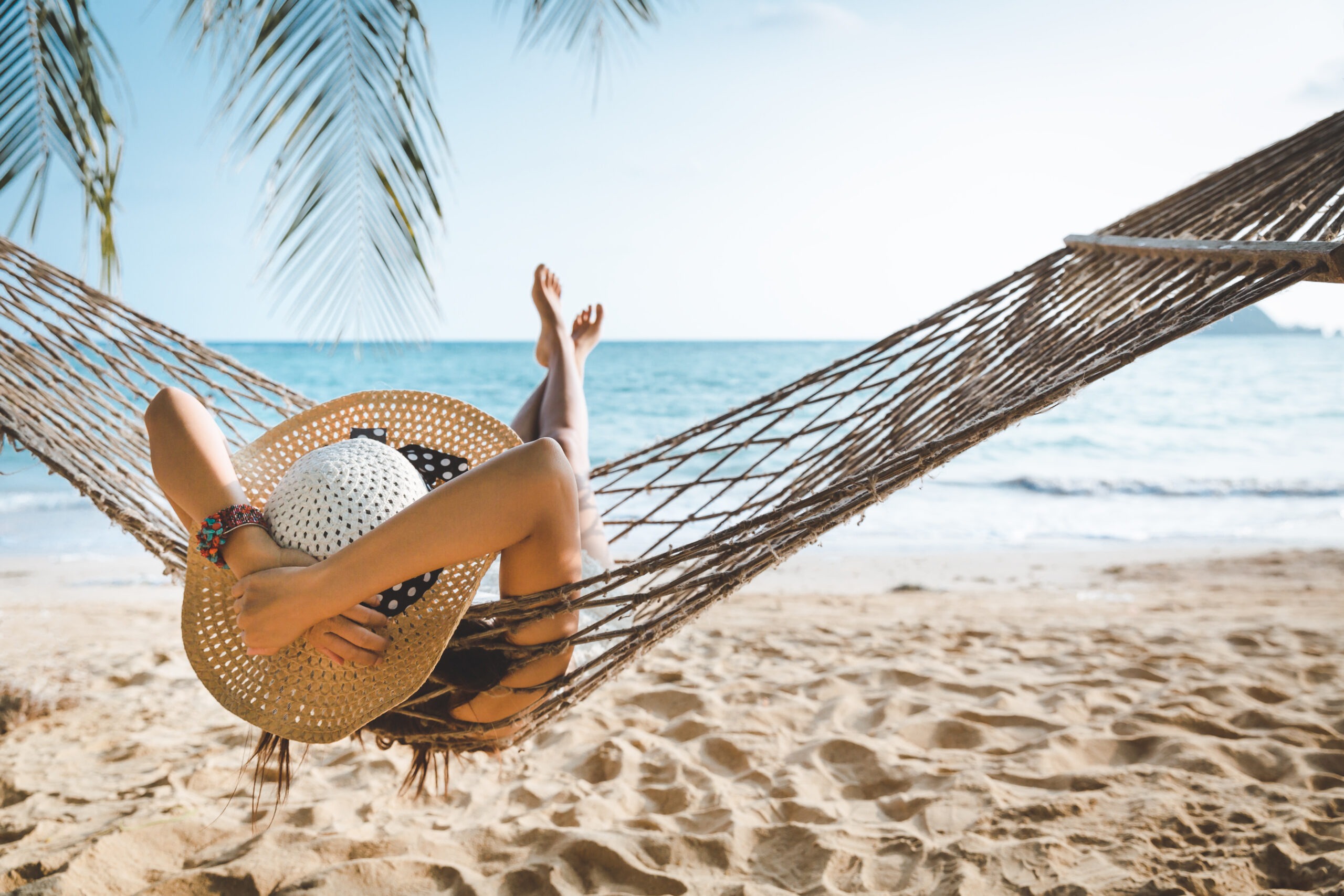 woman in hammock at the beach