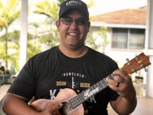 man holding guitar