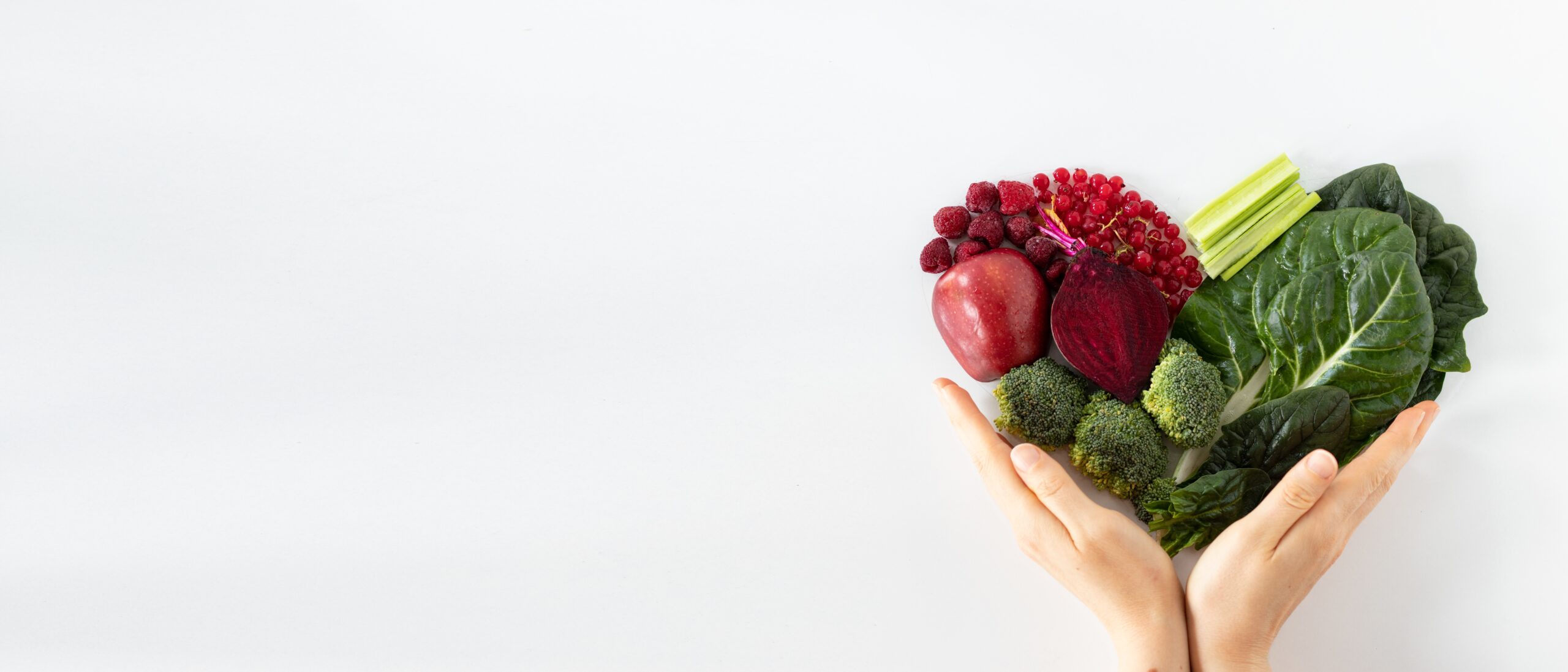 hands holding vegetables