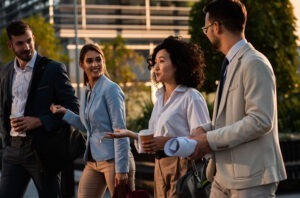 businesspeople walking alongside each other