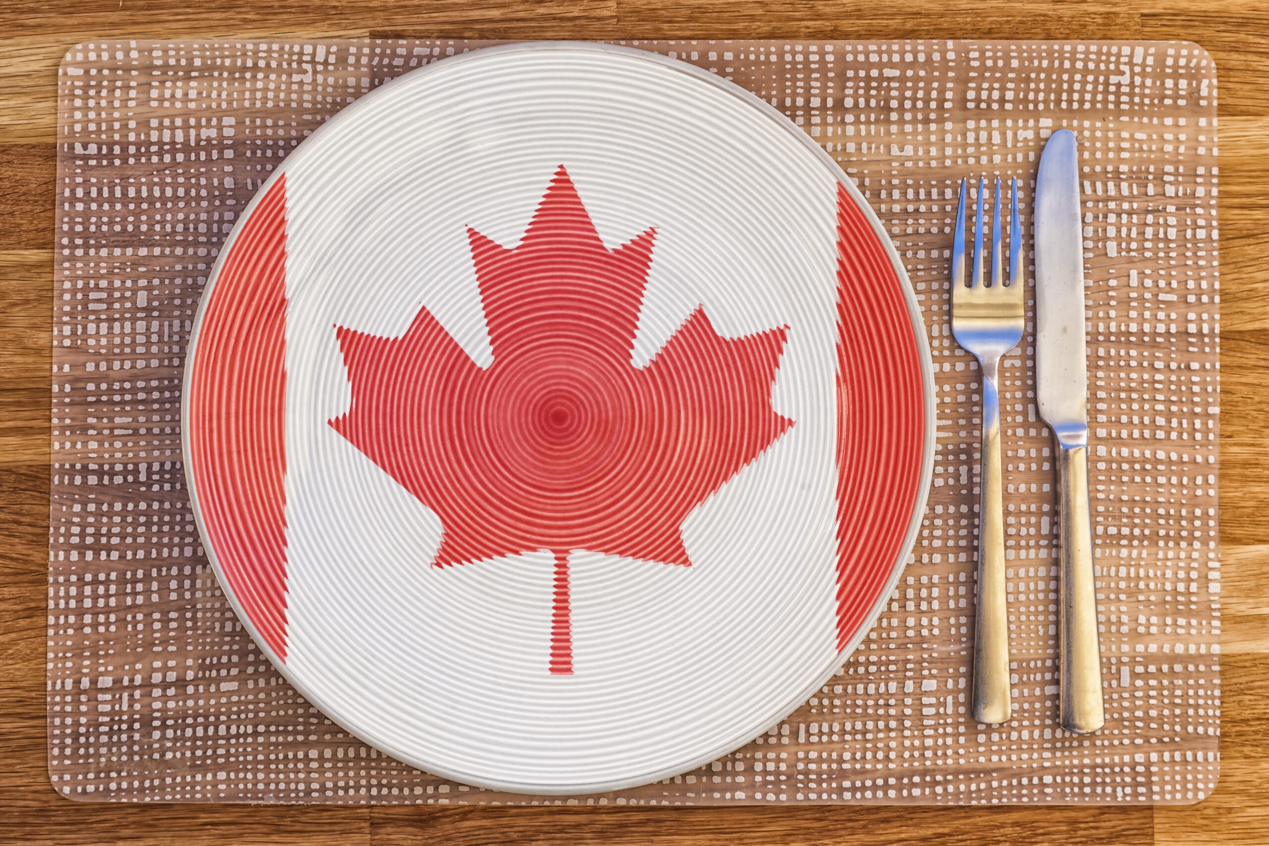 Dinner plate with the flag of Canada on it