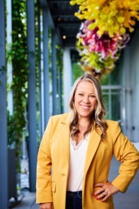 Jo Fostock in yellow sport coat and white shirt