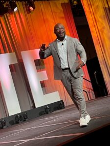 Justin Forsett on stage at FICP Elevate 2024 Conference