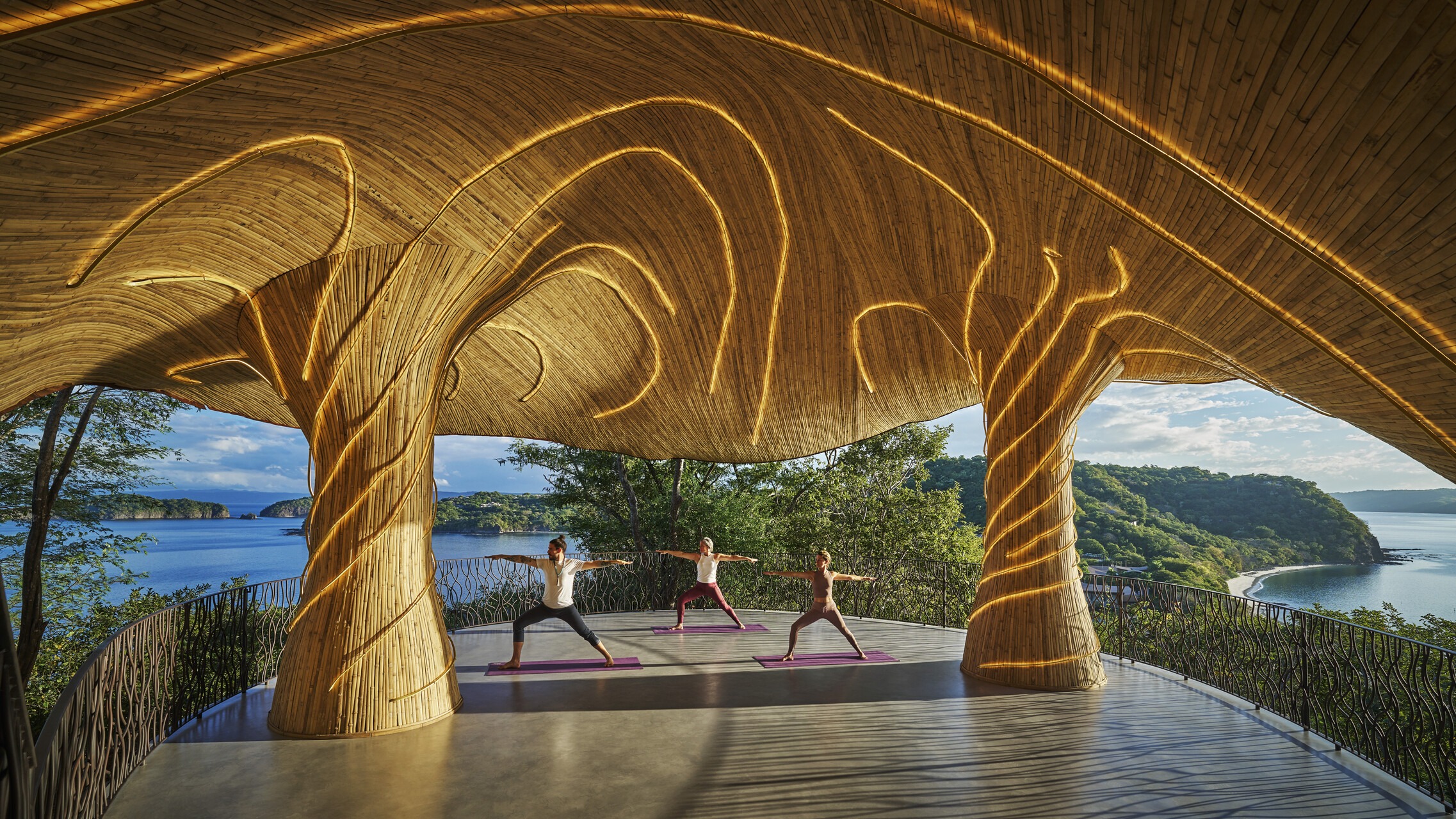 People doing yoga at Four Seasons Resort Peninsula Papagayo